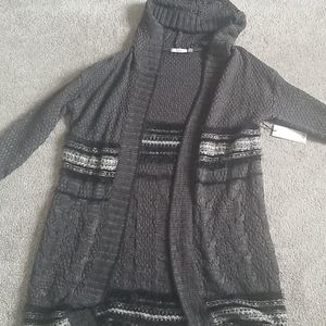 A thick, cotton blend sweater. Hood attached!